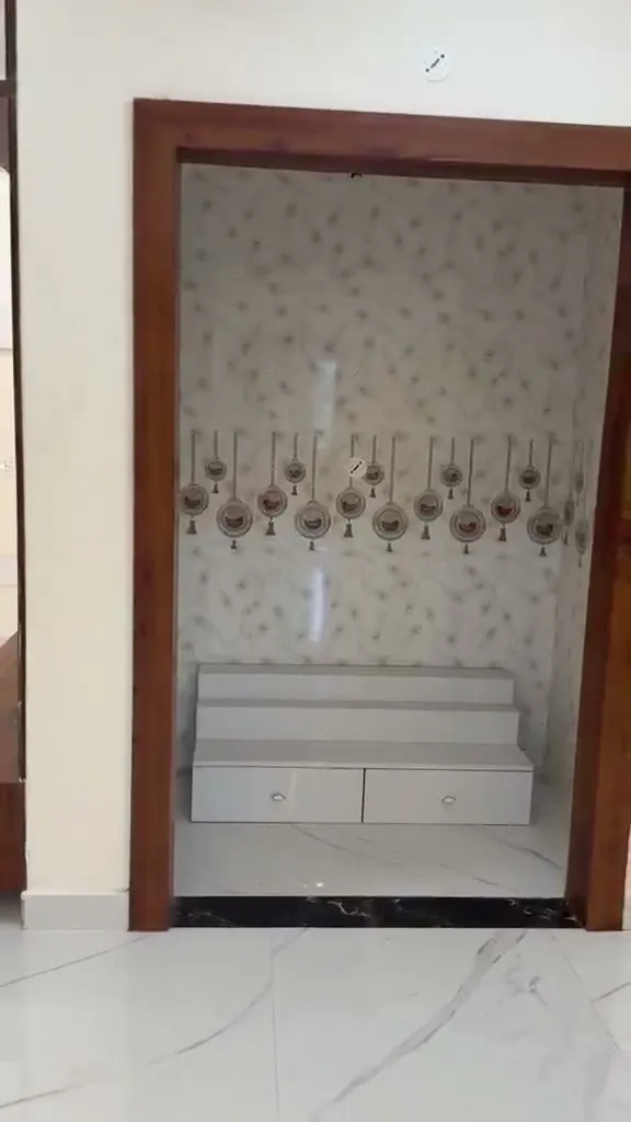 Pooja room finished in marble