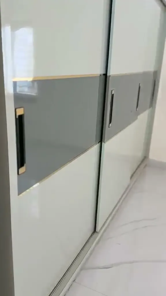 Fitted designer wardrobe in a bedroom